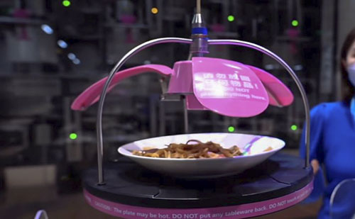 A pekingi olimpián még főznek is a robotok